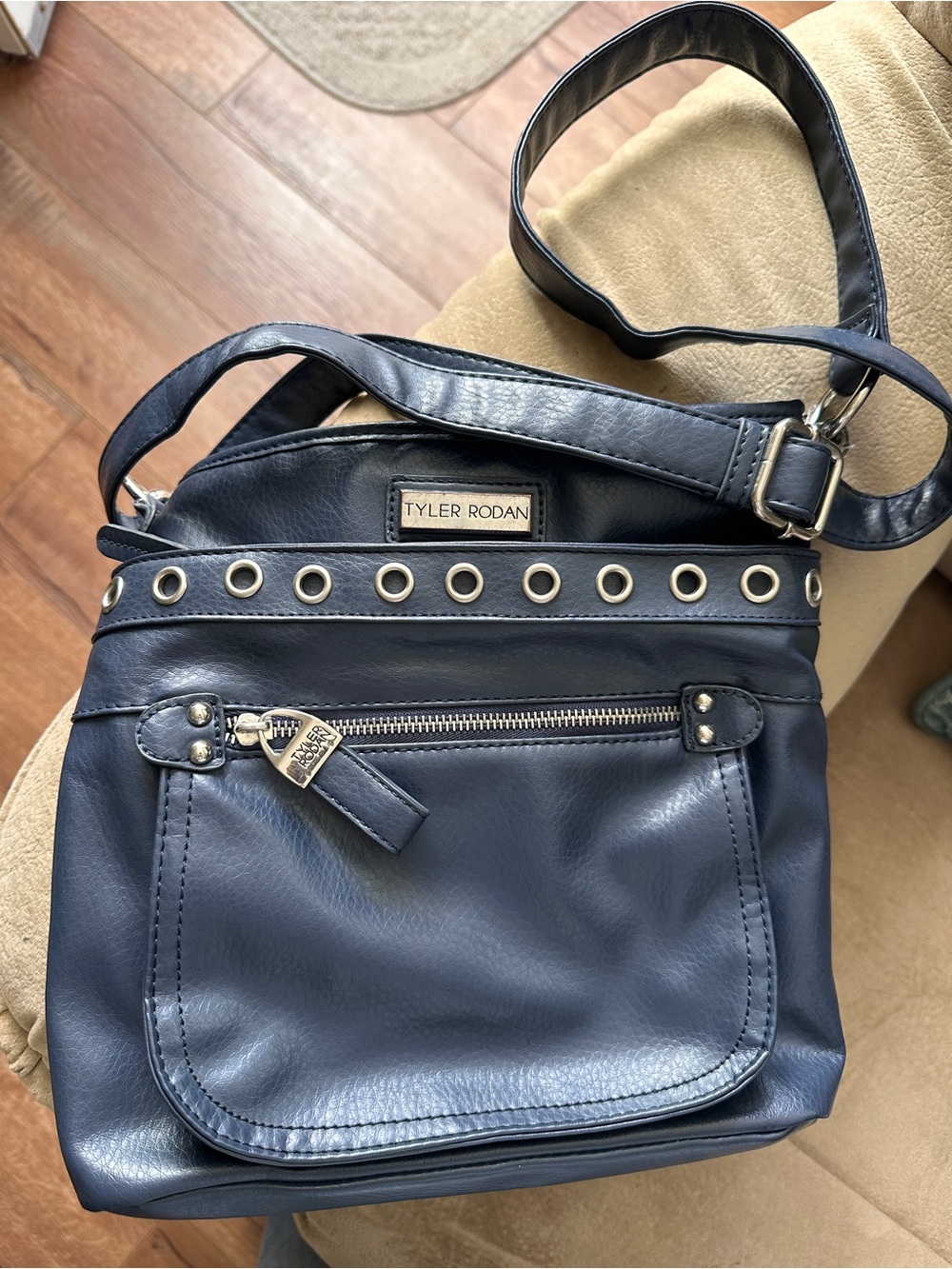 Tyler Rodan Navy Crossbody with Grommet Accents